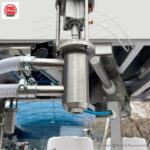 Double nozzle rotary filling and capping machine